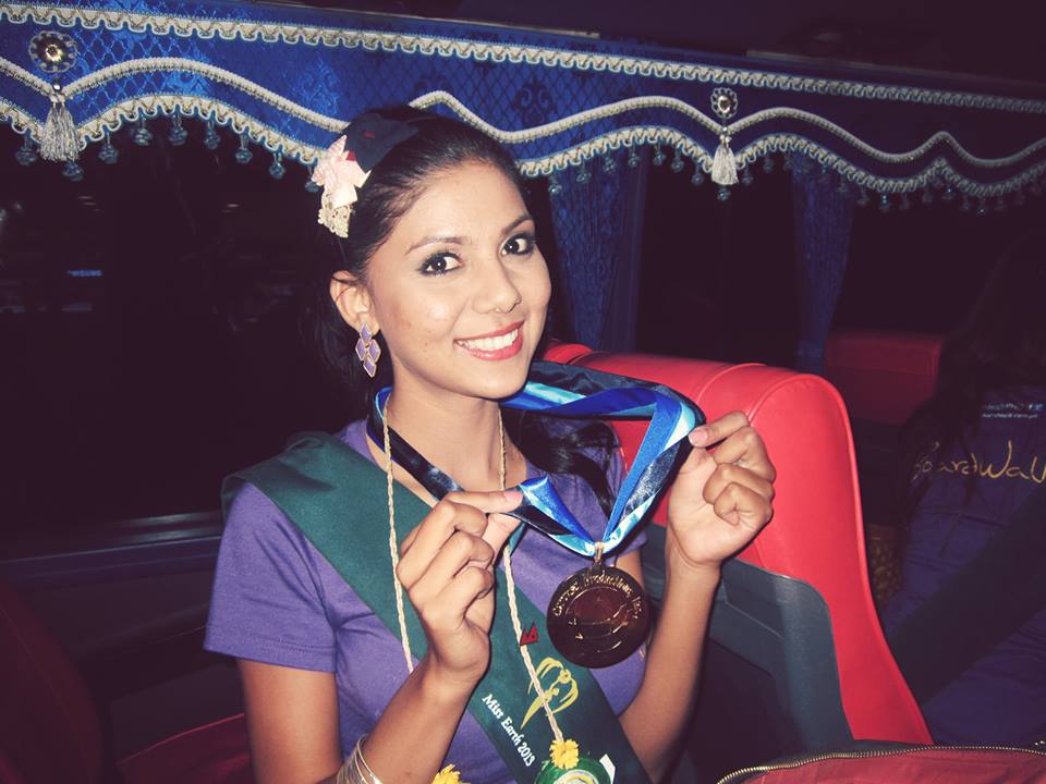 Rojisha with her Gold Medal for Best Child Friendly Award.
